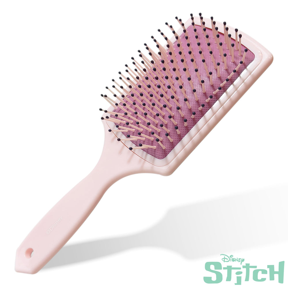Diseño alegre del cepillo que captura la atención de las niñas.