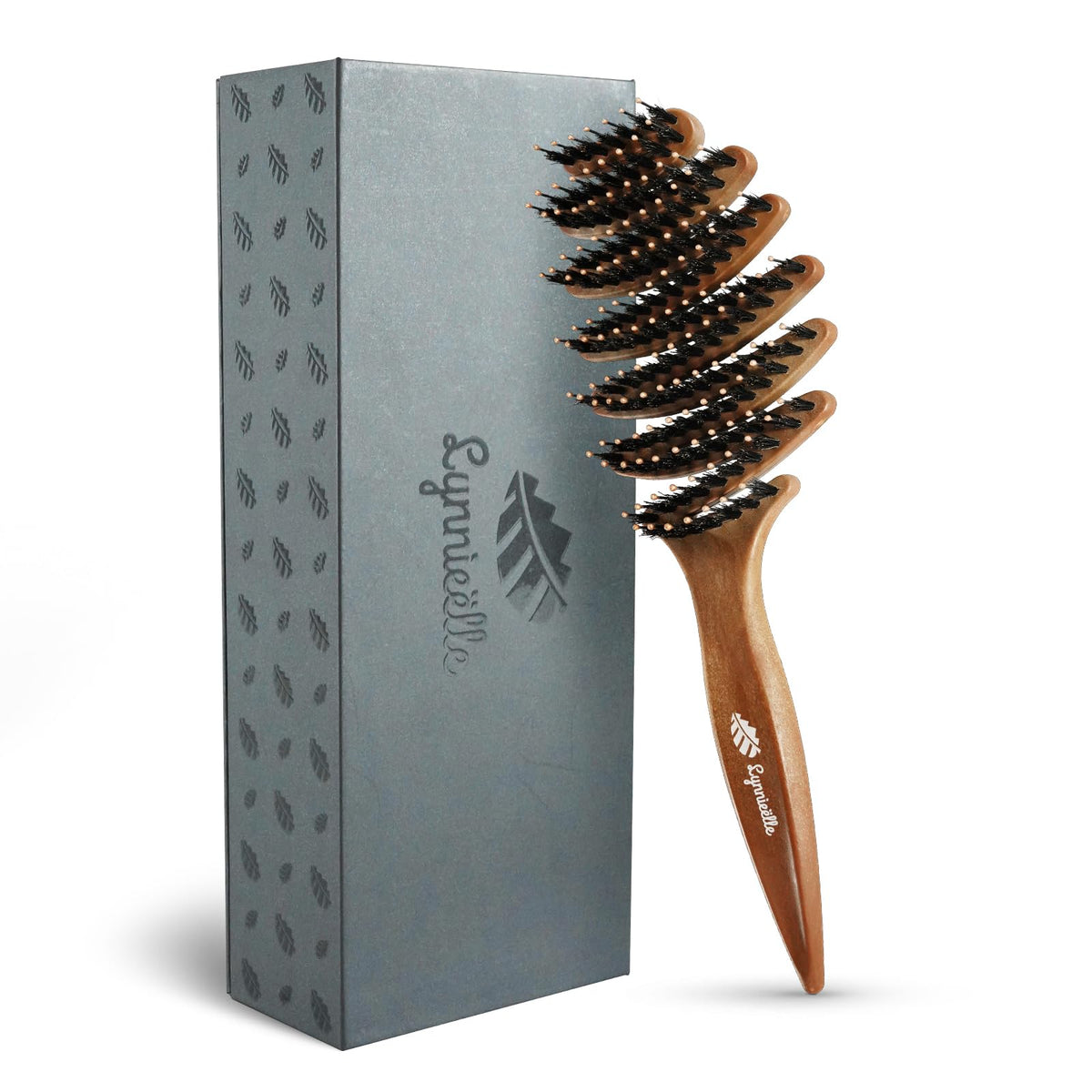 Cepillo Lynnieelle con cerdas de jabali para cabello fino, desenreda suavemente y distribuye aceites naturales.
