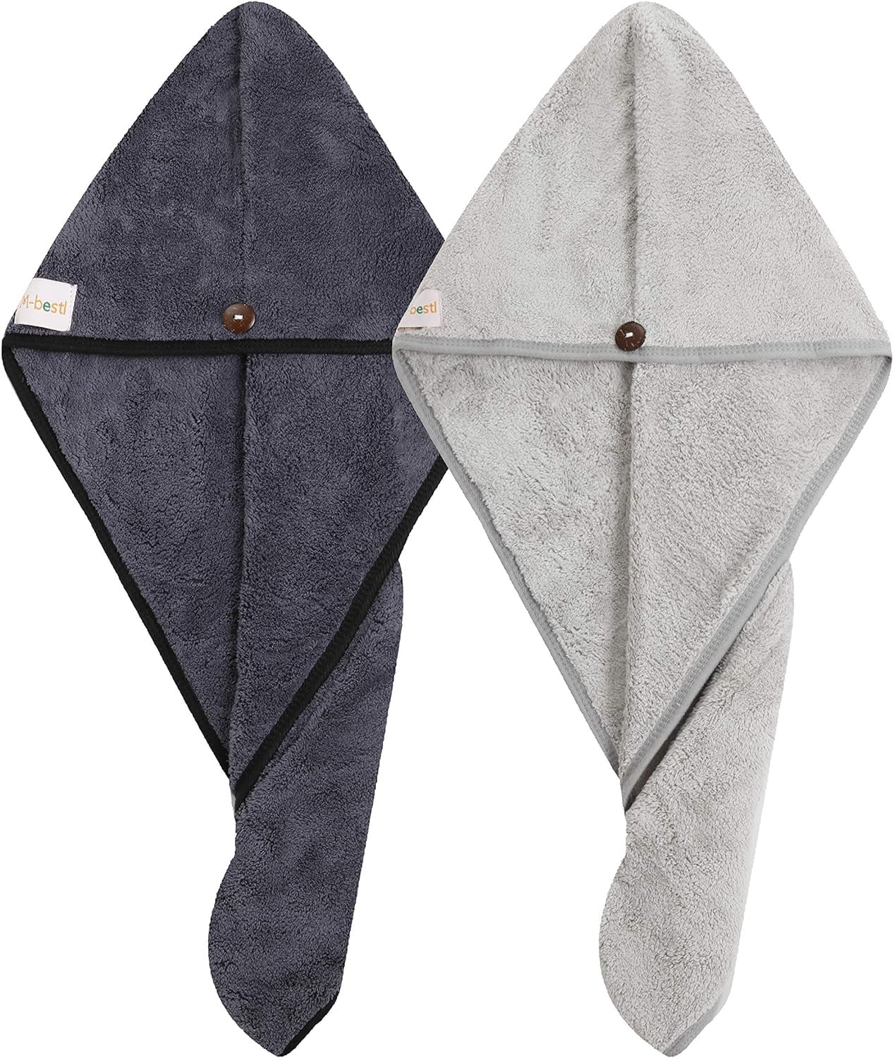 Las dos toallas M-bestl en gris oscuro y gris claro ofrecen versatilidad diaria.