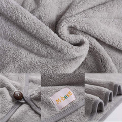 La toalla M-bestl con botón turbante fija el cabello sin deslizamientos.
