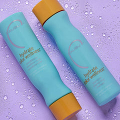 Cabello teñido luciendo brillo gracias a Malibu C Hydrate Color Wellness Shampoo.