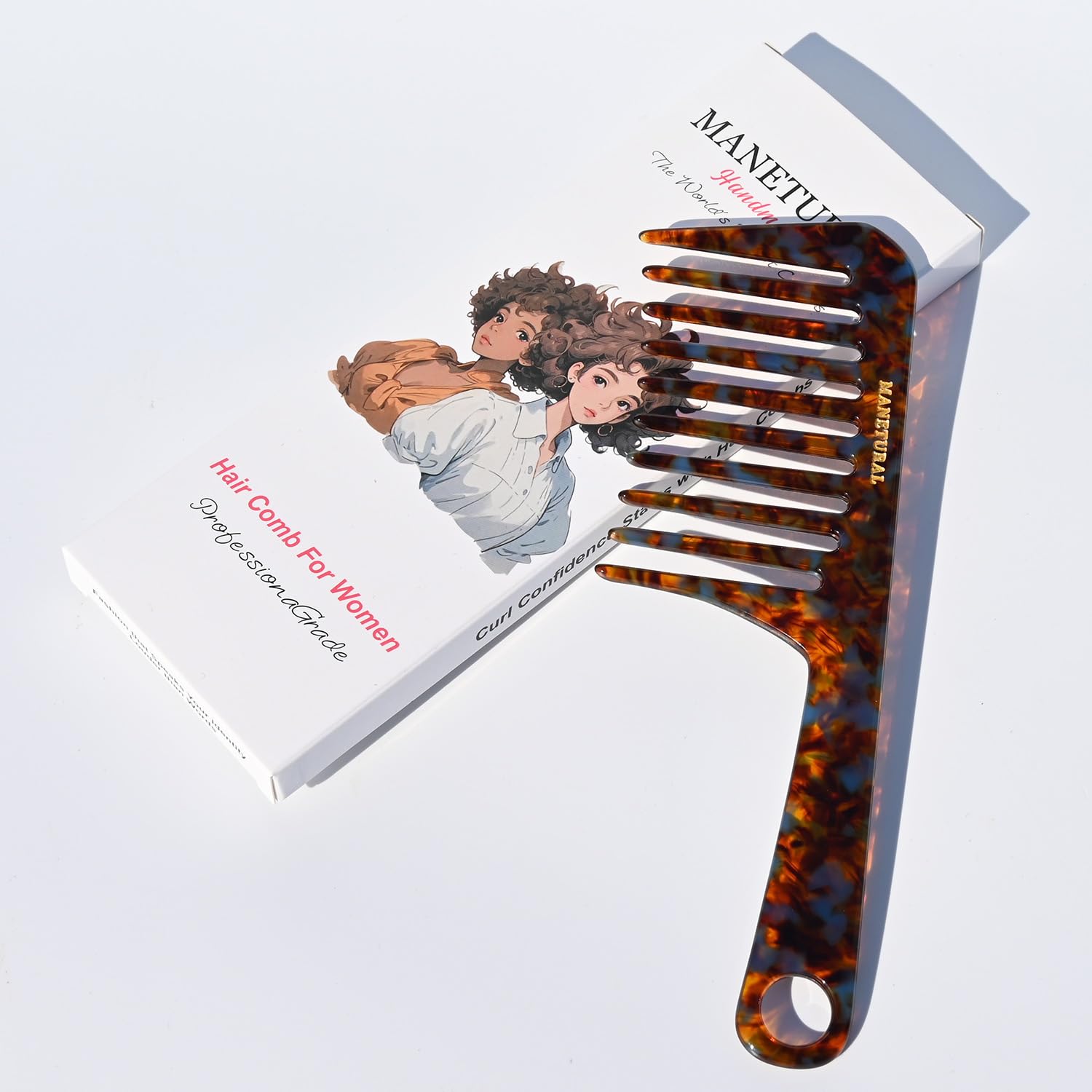 MANETURAL D1, caja elegante, ideal para regalo de cuidado capilar.