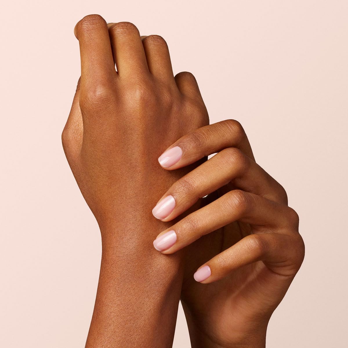 Manucurist Hortencia on nails shows a delicate sheer finish.