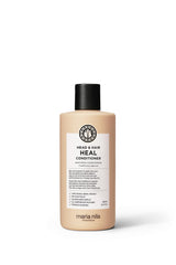 Botella de Maria Nila Head & Hair Heal para cuero cabelludo suave.