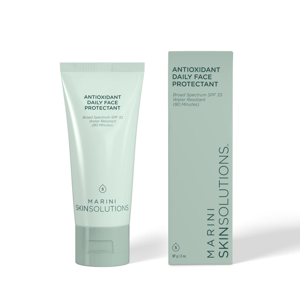 Marini SkinSolutions Protectante Facial diario, botella visible, protección SPF 33 para uso diario.
