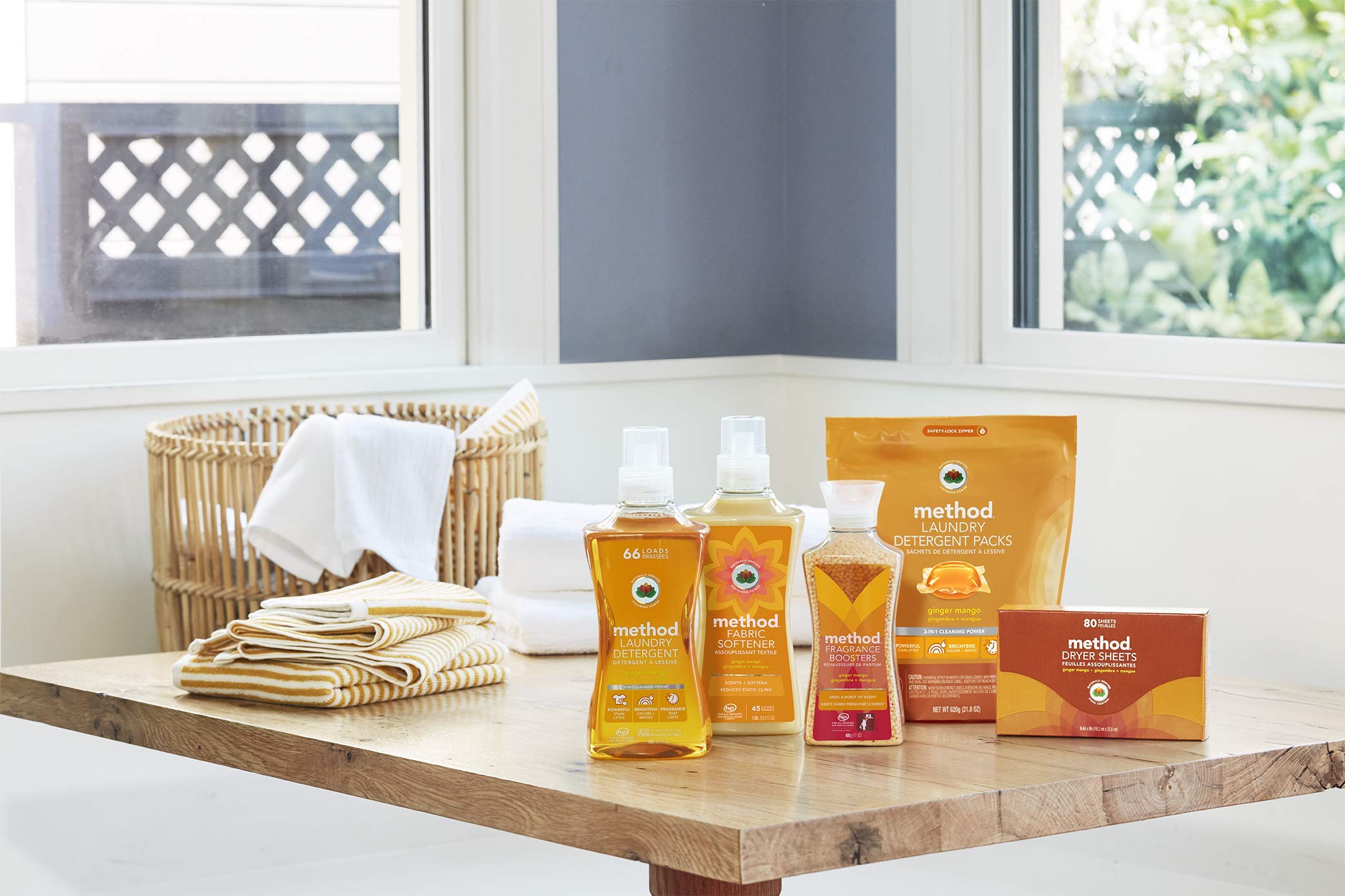 Contenedor de 14.8 onzas de Method Fragrance Booster Ginger Mango.