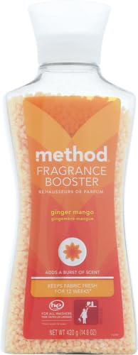Perla Fragrance Booster Ginger Mango disolviéndose en agua para aroma duradero.