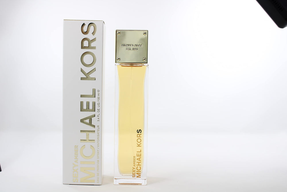 Michael Kors Sexy Amber, embalaje detalle, perfecto para regalo con presentación cuidada.