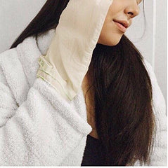 MicrodermaMitt exfoliación cuello mejora tono y textura de la piel.
