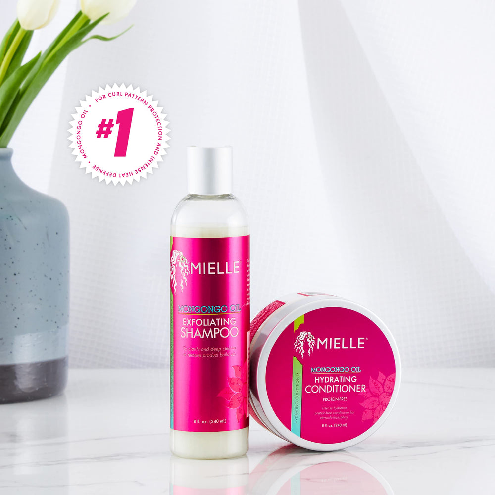 Envase de 8 onzas de Mongongo Exfoliating Shampoo listo para uso regular.