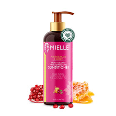 Mielle Organics Granada y Miel, botella del acondicionador desenredante para rizos definidos.