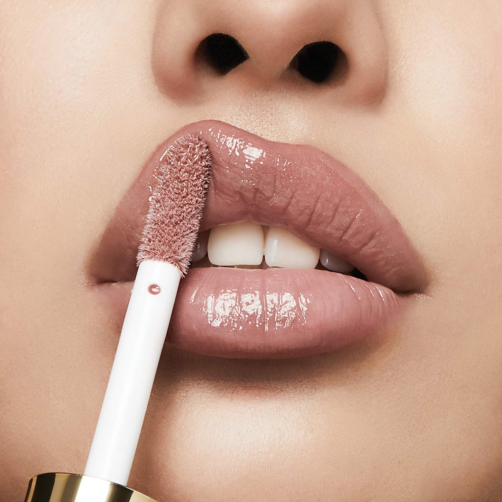 Front packaging of Milani lip gloss in Soft Rose