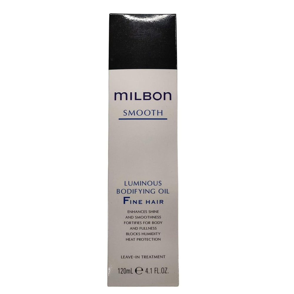 Milbon Aceite Bodificante en mano durante aplicación: controla el encrespamiento y ofrece cuerpo.