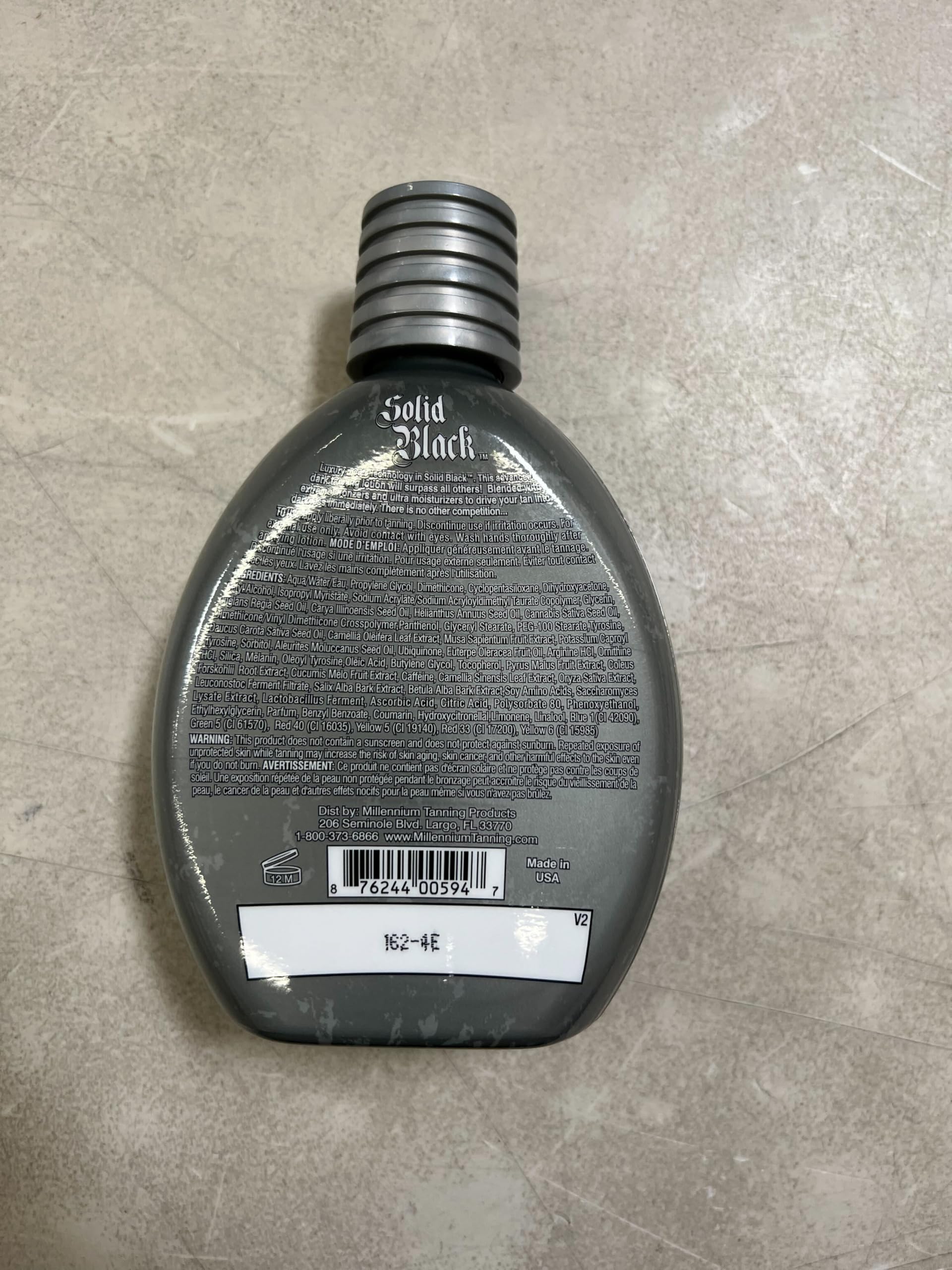 Millennium Tanning Solid Black 100X: envase de 400 ml para uso prolongado