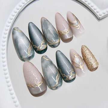 Uñas MINGCHUN ojo de gato, almendra corta, diseño marmolado en 3D para elegancia diaria.