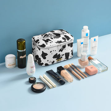 MIRASON estuche maquillaje estampado vaca mediano, perfecto para bolso diario y organización.