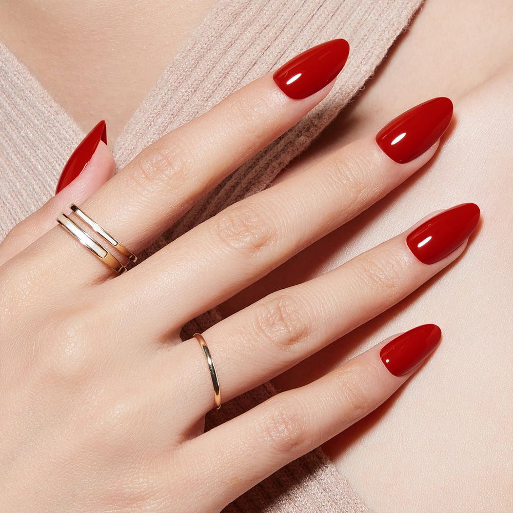Conjunto Modelones de uñas autoadhesivas forma almendra rojas, listo para aplicación.