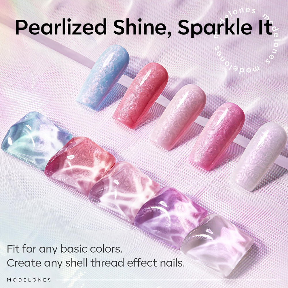 Modelones efecto concha marina para arte de uñas con destellos sutiles.