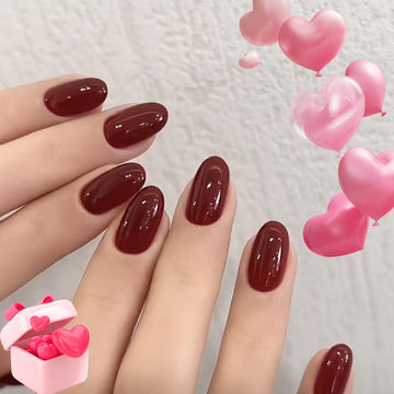 Modelones uñas postizas press-on rojas oscuras ovaladas, fáciles de aplicar en minutos.
