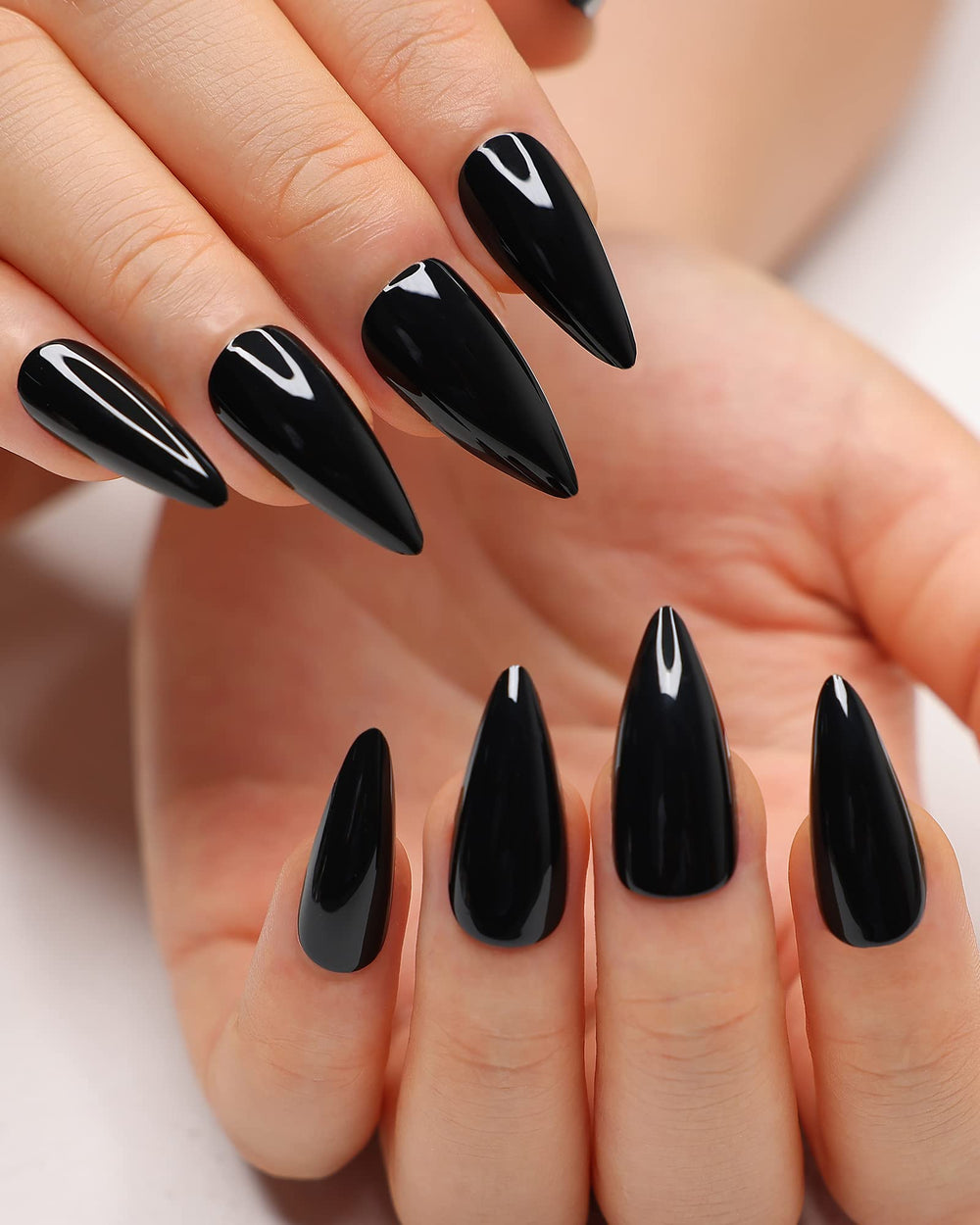 Morily uñas postizas negras estiletto con acabado brillante para ajuste preciso.