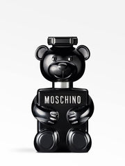 Moschino Toy Boy, detalle del oso en el logo, presencia para eventos.