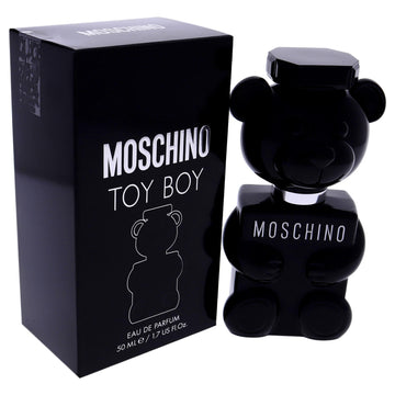 Moschino Toy Boy, frasco brillo, visión moderna en el escritorio.