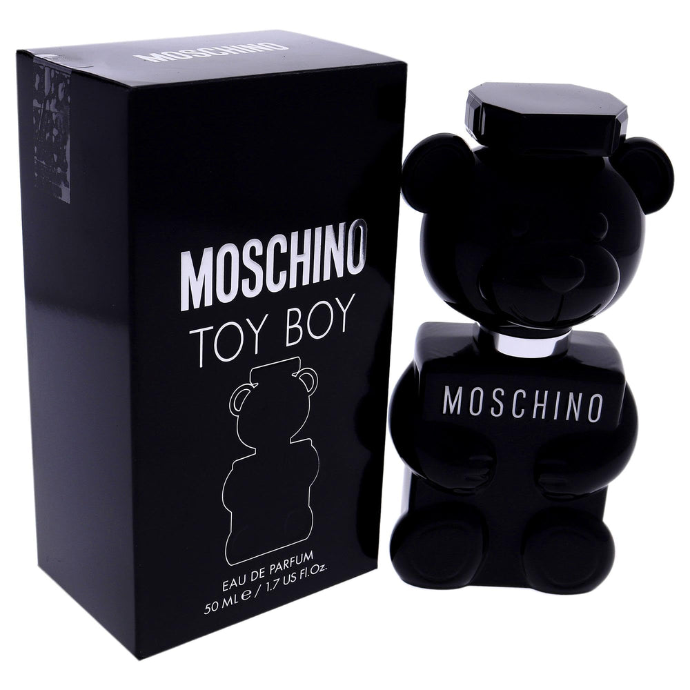 Moschino Toy Boy, frasco brillo, visión moderna en el escritorio.