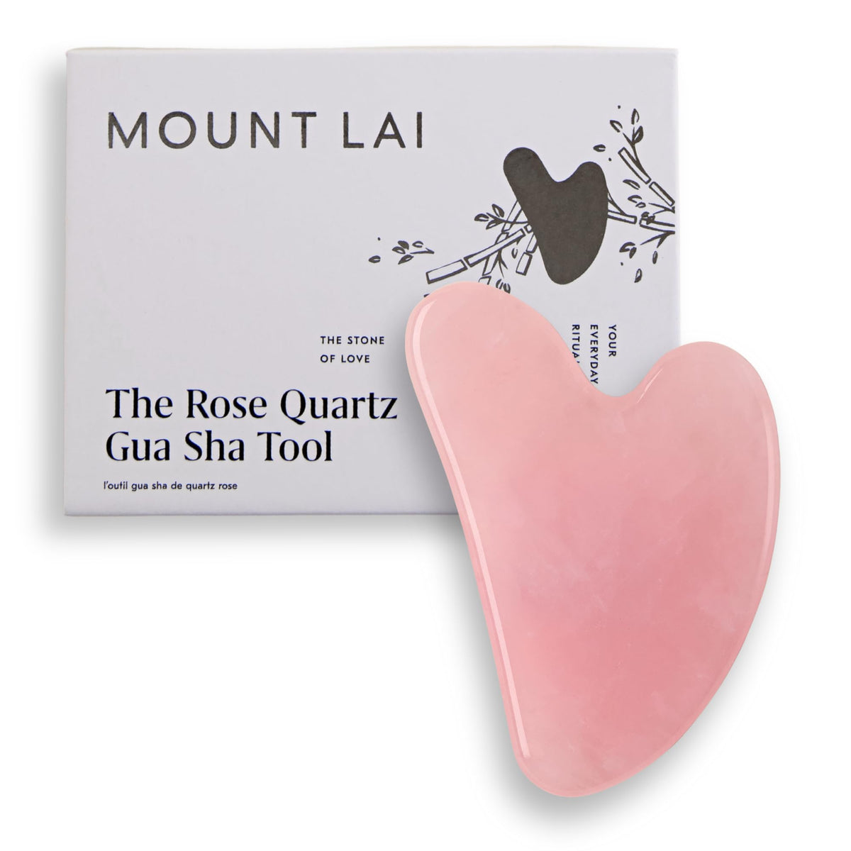Gua sha Mount Lai de cuarzo rosa para la frente, promueve drenaje suave y luminosidad.