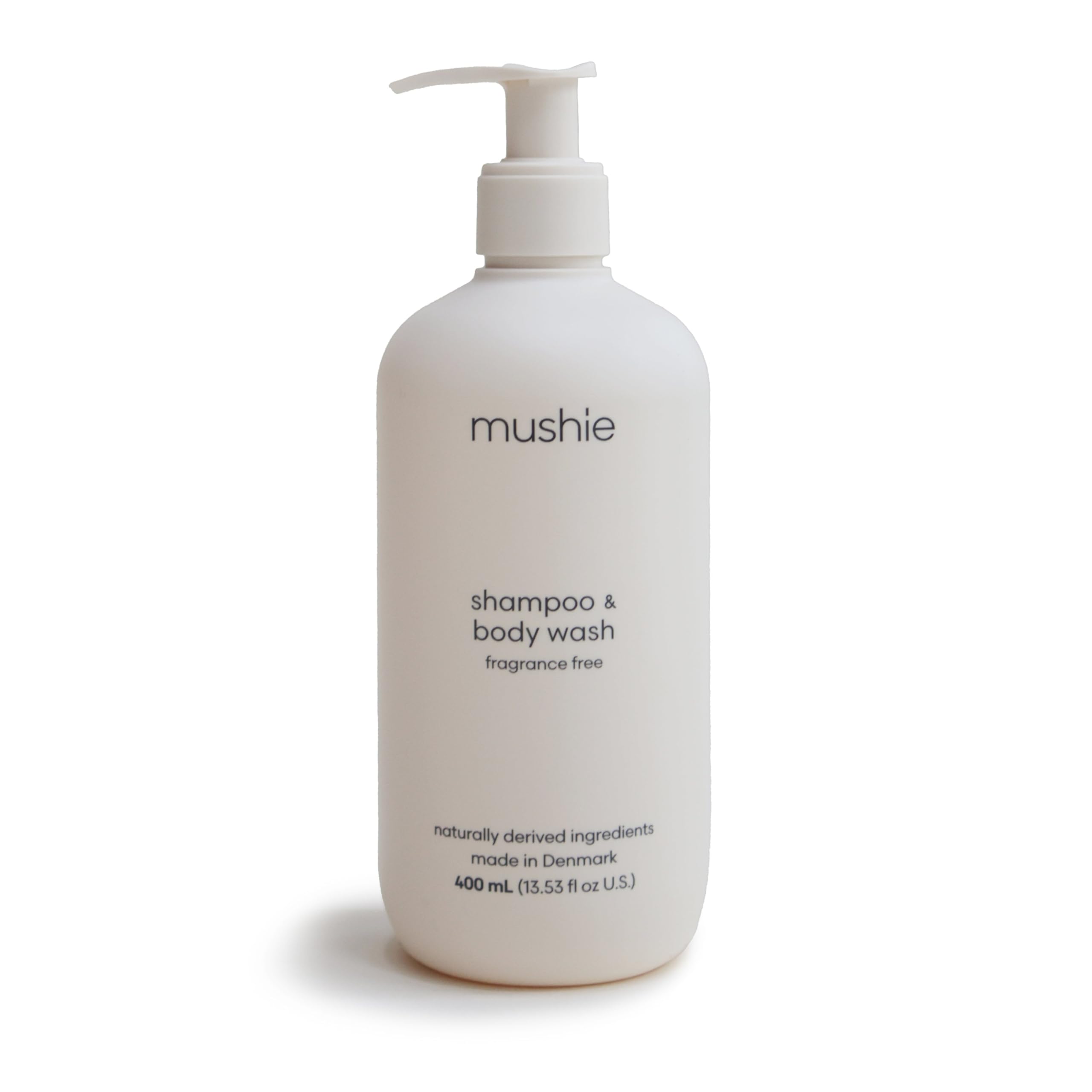 Mushie Baby Shampoo & Body Wash en botella, cuidado suave diario para piel sensible.