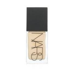 NARS Base de maquillaje de luz reflectante L3 Gobi, botella, acabado luminoso y natural.