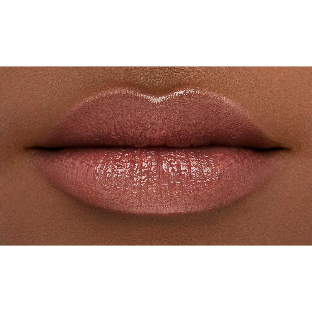 NARS Orgasm Afterglow Lip Balm para uso diario con acabado luminoso natural.