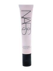 Perles encapsulées libérant la protection solaire sur la peau, primer NARS.