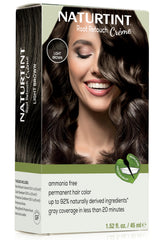 Conjunto de coloración Naturtint con tazón y brocha para retoques precisos.