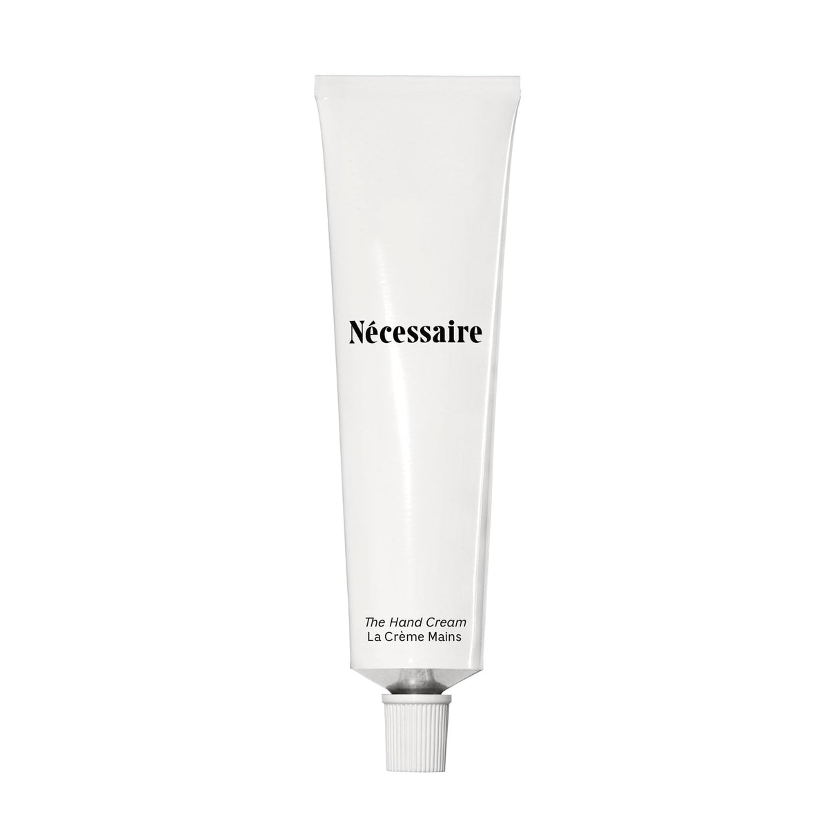 Nécessaire crema de manos: botella visible y hidratación suave para piel seca.