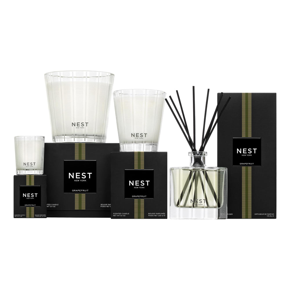 NEST New York Grapefruit Liquid Soap bottle with citrus swirls evokes fragrance.