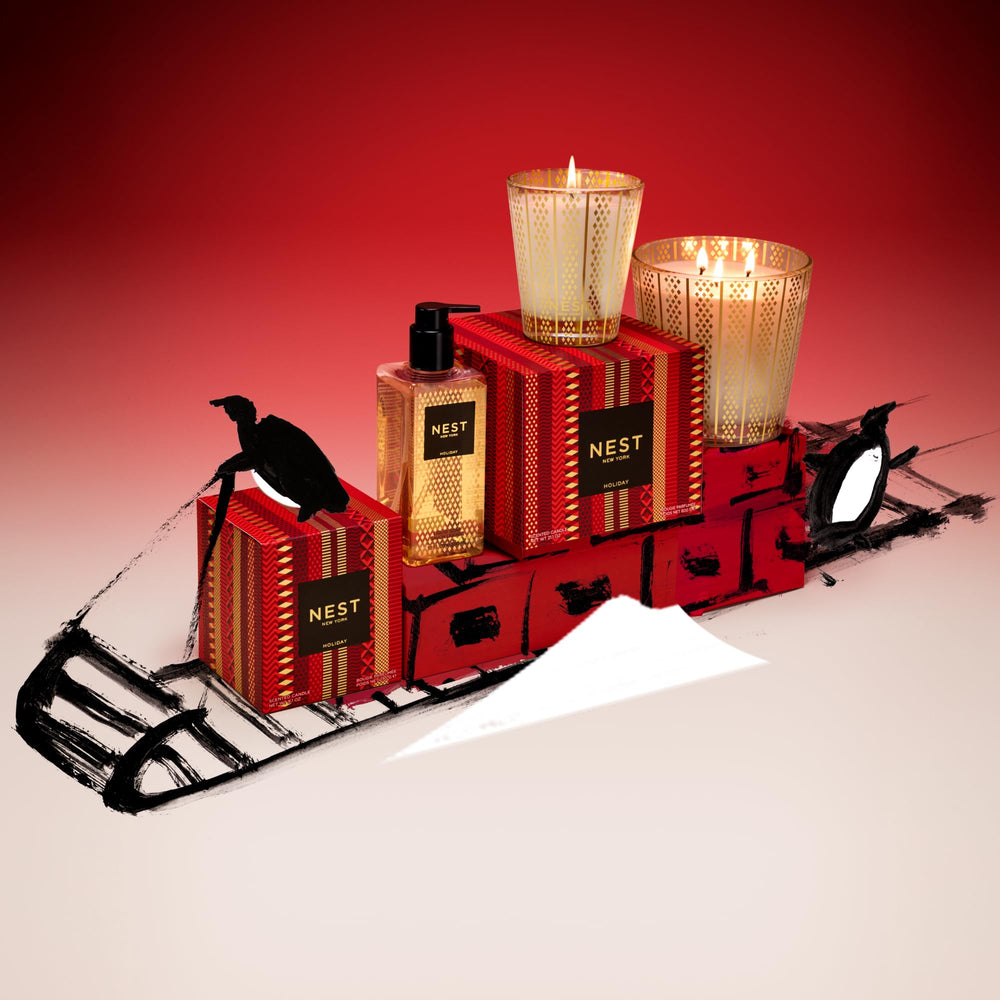 NEST New York savon liquide Noël : agrumes et bois pour une ambiance festive.