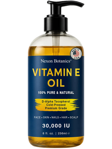 Nexon Botanics Pure Vitamin E Oil bottle pour for easy skin hydration