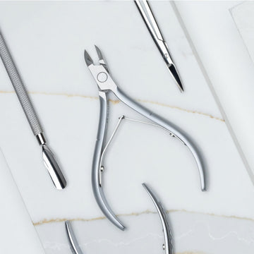 NGHIA corta-cuticulas en mano ergonomica para salones