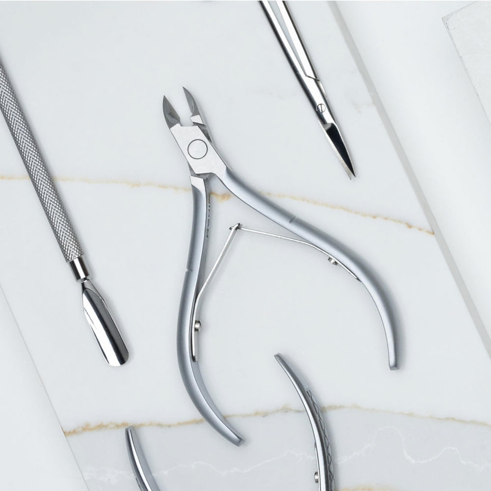 NGHIA corta-cuticulas en mano ergonomica para salones