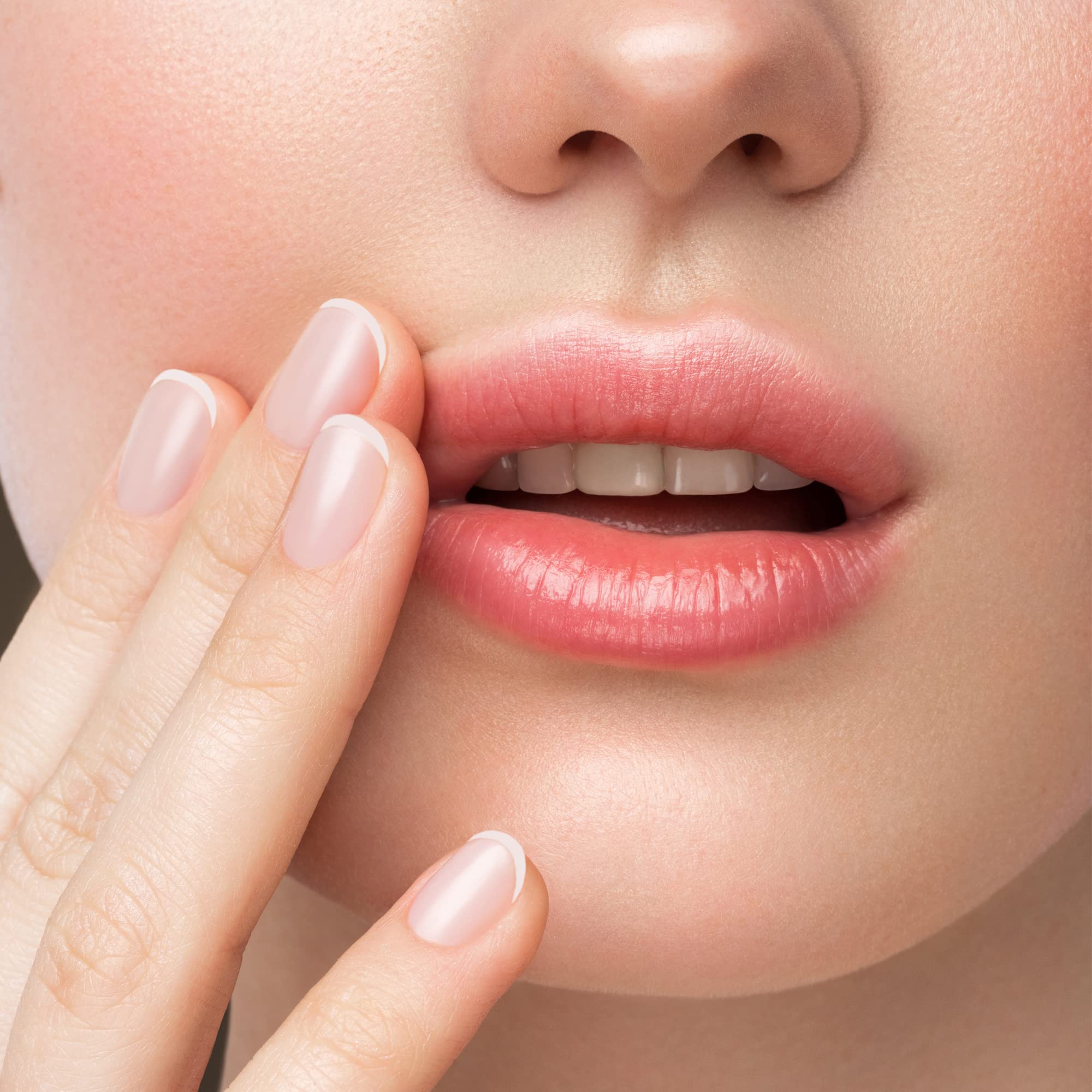 Nicole Miller lip gloss label close-up with cruelty-free adult-use branding.