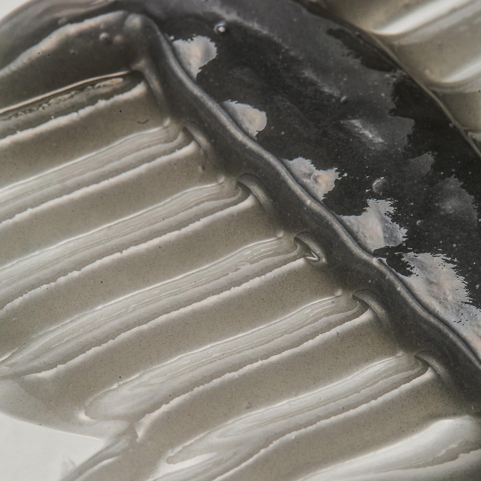 NIDA Arroz Negro Exfoliante Suero, uso diario; poros más finos y piel luminosa.