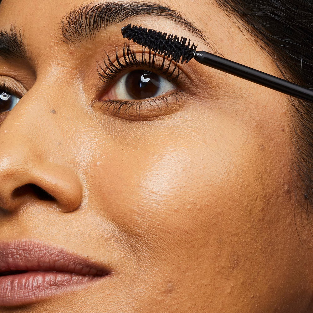 Close-up of straight brush in action providing even lash coat for No7 mascara.