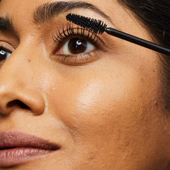 Close-up of straight brush in action providing even lash coat for No7 mascara.