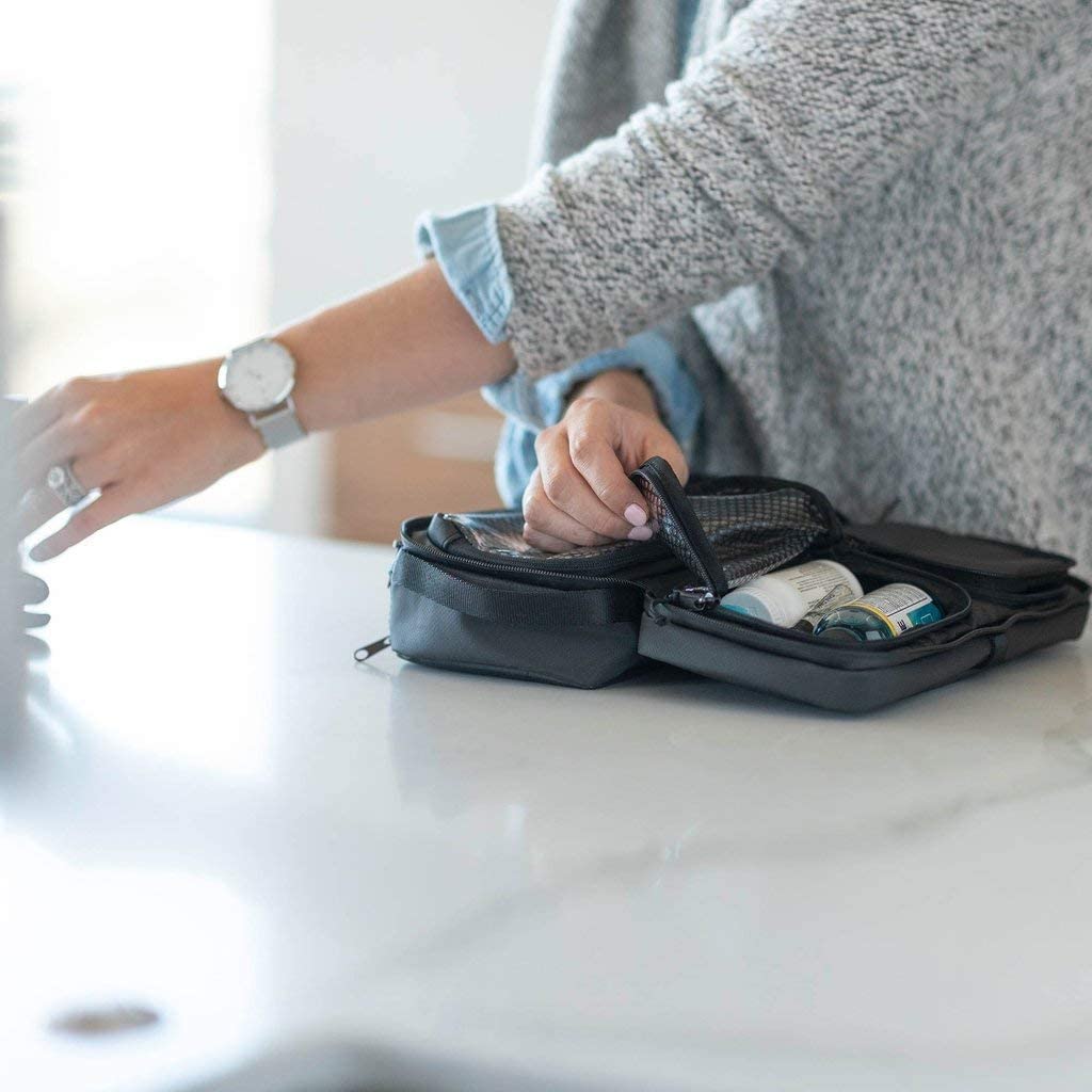 NOMATIC bolsa de aseo con gancho, práctica para colgar.