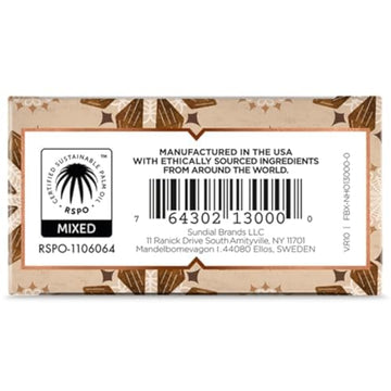 Jabón Nubian Heritage con avena y vitamina E, exfolia suave y nutre.