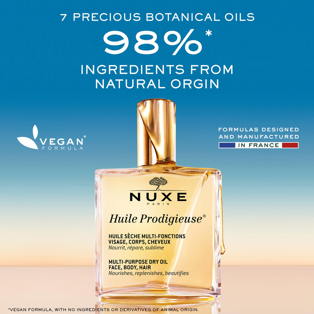 Nuxe Huile Prodigieuse, botella en escaparate, ideal para cabello nutrido y brillo natural.