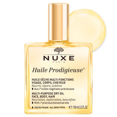 Nuxe Huile Prodigieuse, primer plano de la botella, para brillo suave en rostro y cuerpo.