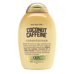 OGX botella de acondicionador fortificante con cafeína y coco para fortalecimiento.