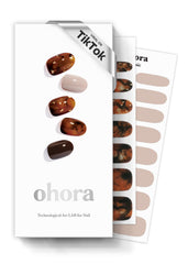 Caja ohora con laminas semicuradas brown sugar para manicura rápida y de estilo marmolado.