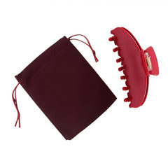 Pinza para cabello OideGuiing con acabado antideslizante y color rojo cereza.